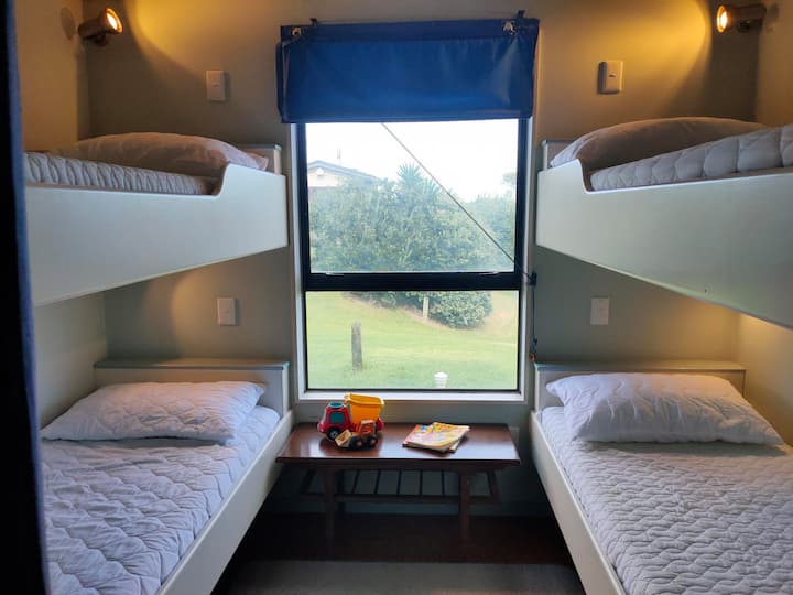 Four single beds - suitable for ages 2-18