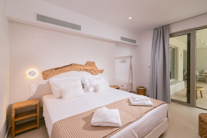 Villa Vissalo is decorated with a bohemian charm and wood details.