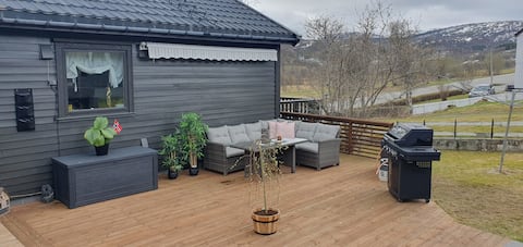 Detached house with large outdoor area.