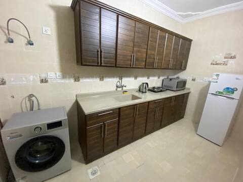 Two-bedroom apartment, kitchen, and bathroom