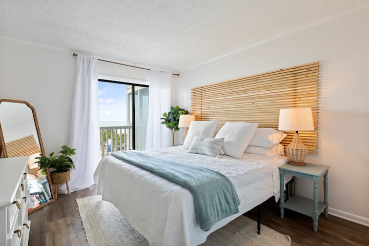 Experience true luxury in your master bedroom, complete with a charging station, fan, closet with extra blanket and pillows, private en suite bath, a Roku TV for your entertainment needs, and a charming private balcony.  