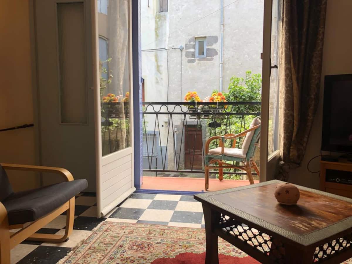 Living room at Maison Embonne with balcony