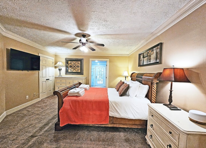 Lower level queen bedroom with full bath, TV, and extra large closet.