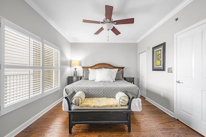 1st Master bedroom with plantations shutters and brand new 55 inch TV (2024) and private bathroom