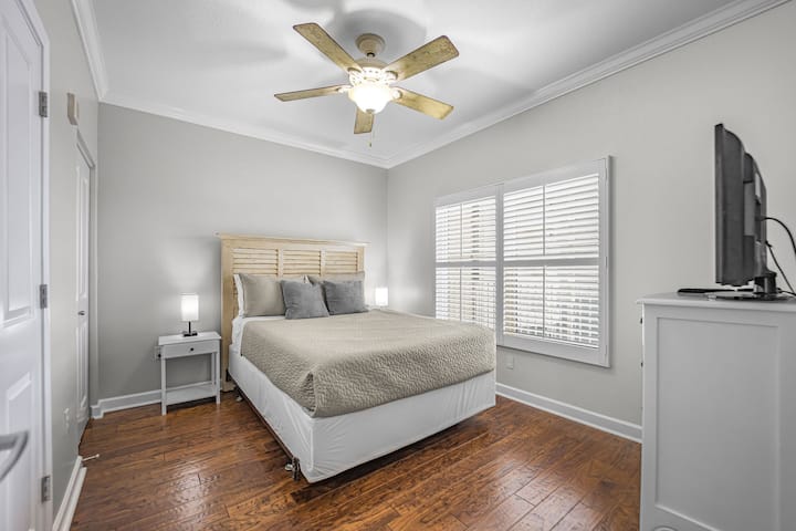 2nd Master bedroom with plantation shutters and private bathrooms 