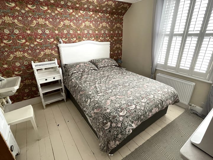 Dormitorio diseñado por William Morris