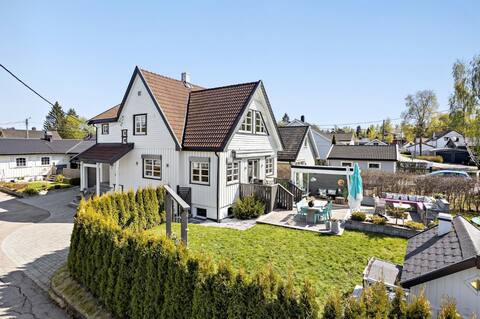 Central single-family home with  garden and parking