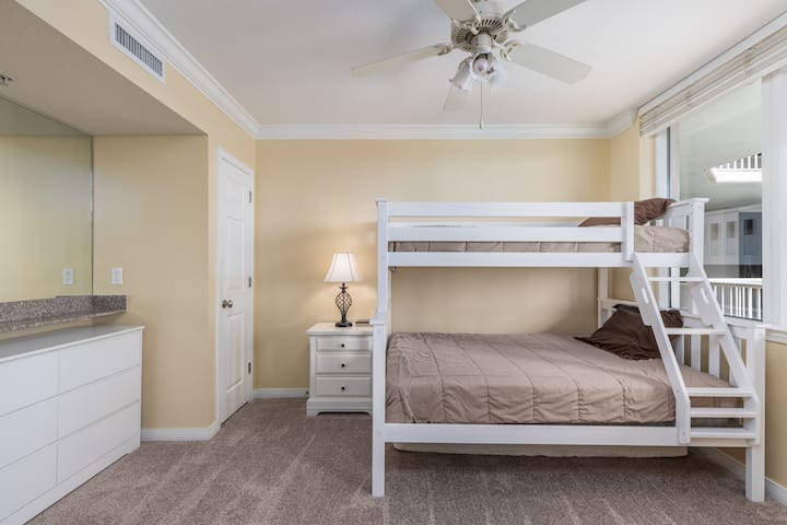 Plenty of room to sleep everyone. Twin over full bunk, with twin trundle. This room also has views of the beach and a TV to keep the kids entertained all night.