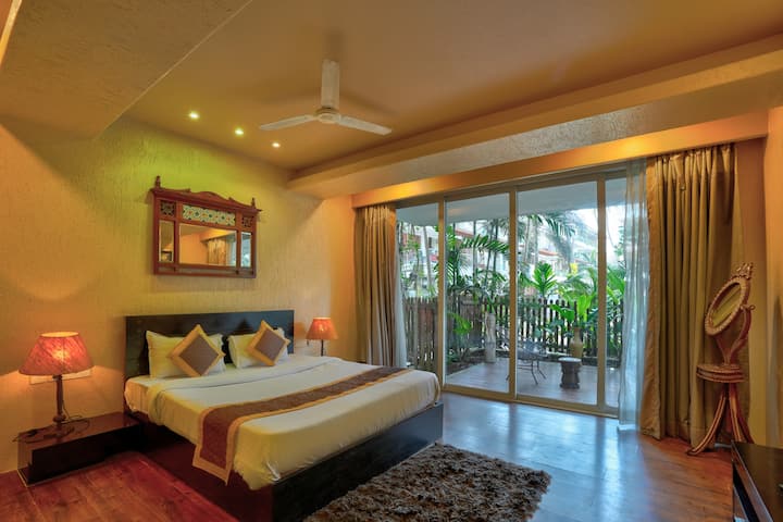 Master Bedroom With Patio Access and Smart UHD TV