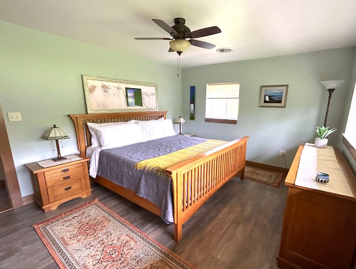 Spacious master bedroom with King Bed and lots of natural light.