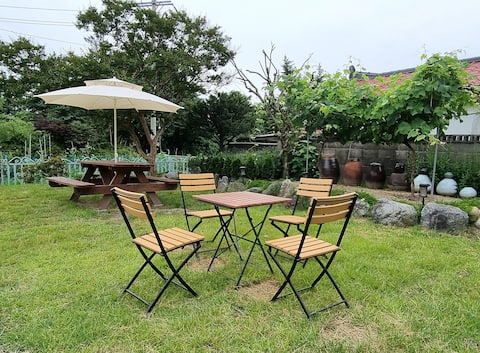 Yeongok Baujip (cost-effective accommodation, 200 pyeong private house, outdoor tent next to the garden, Yeongjin Beach walking course)