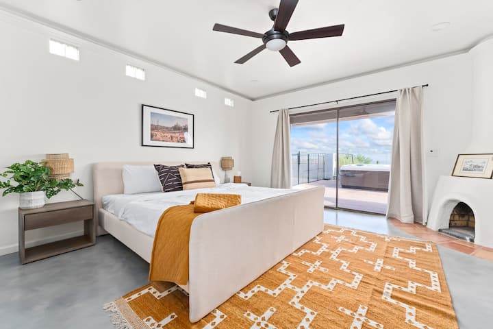 King bed, access to the patio, downstairs near living room and kitchen.