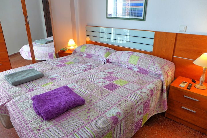 The bedroom has twin beds, air conditioning and a ceiling fan, with a wardrobe and chest of drawers.  The beds can also be made up as one large double.
