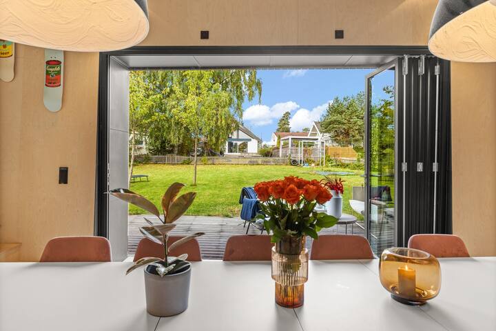 Unikt hus med spektakulært kjøkken og deilig hage