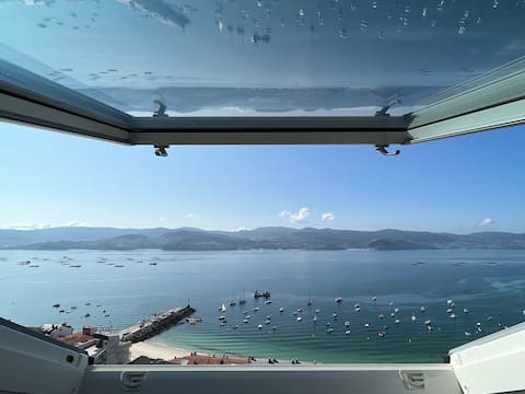 Anuncio de Airbnb popular: Penthouse with views in Raxó en Poio