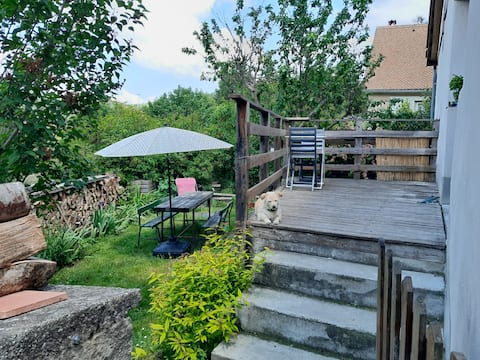 Village house with garden.