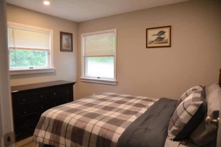 Guest Bedroom with dresser and closet.