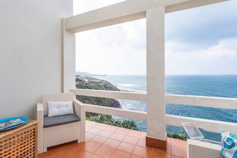 A pretty house overlooking the sea