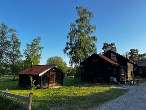 Charming log house with jetty
