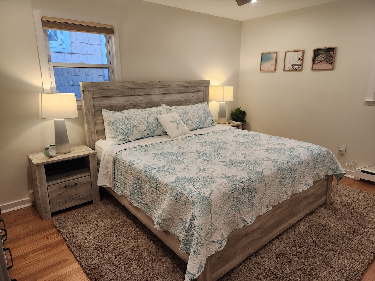 Bedroom 2 with King Size Bed, Dresser, Smart TV, Ceiling Fan and Window Air Conditioner