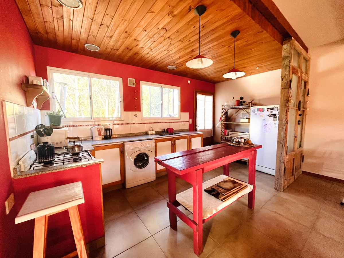 Successful Airbnb property: A warm house in a quiet neighborhood, close to downtown in San Carlos De Bariloche