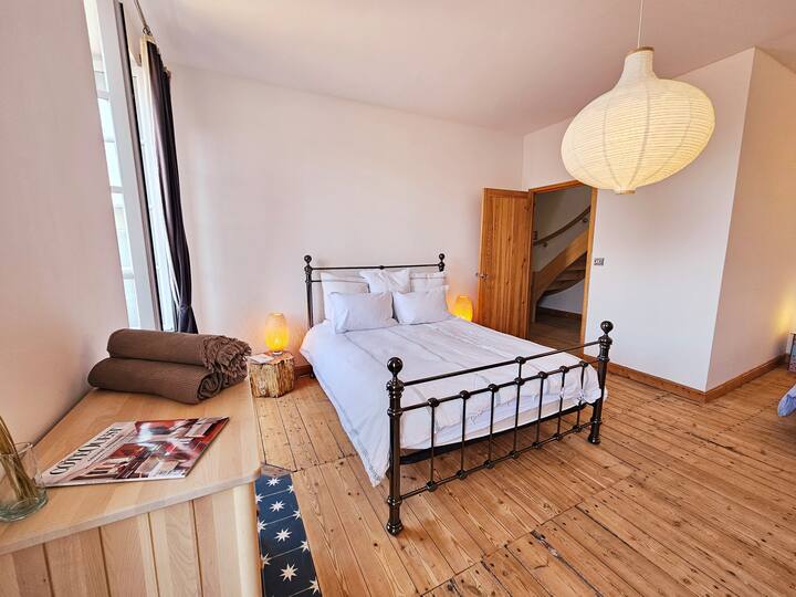 1st bedroom with a double bed and 2 x beds