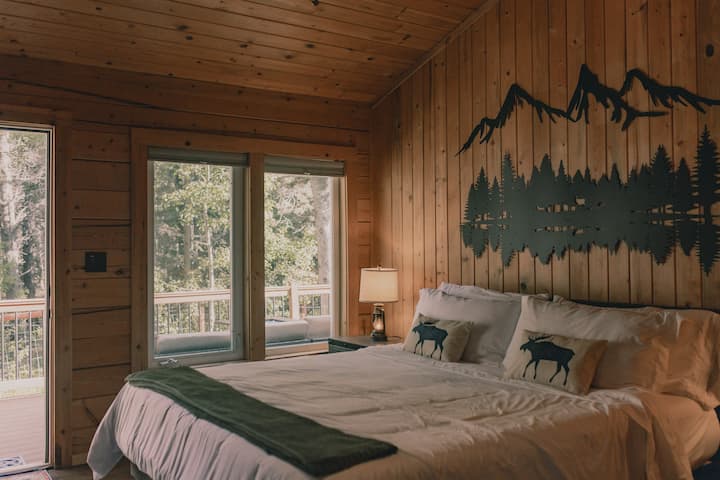 Cozy master bedroom with a private door that gives you access to the deck