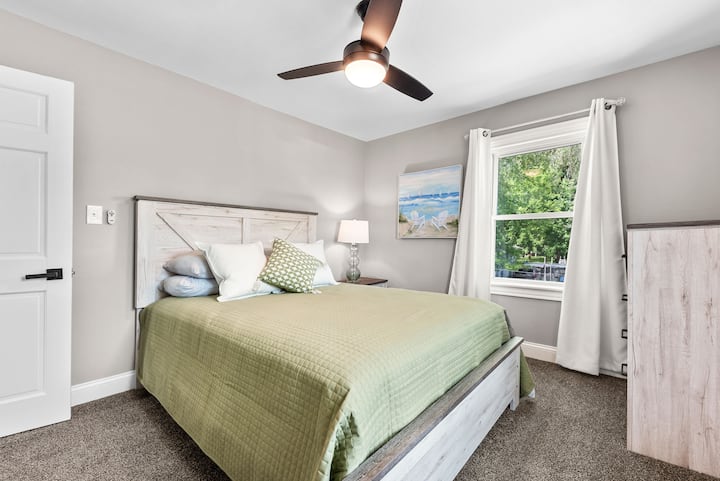 Second bedroom well equipped for comfort with ceiling fan, brand new Beautyrest mattress with adjustable base, room darkening curtains and Sealy firm and soft pillows on each side.   This room also has a full closet and lake views.  