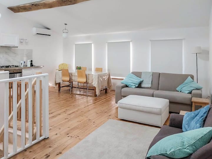 Main living space with blinds down to keep out the heat of the afternoon sun