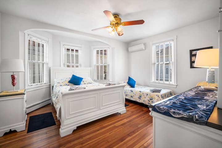 This vintage bedroom has a bright, modern touch.