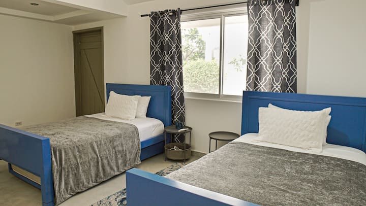 Casa Las Vistas bedroom 4 with two full beds and trundles — San José del Cabo villa rental