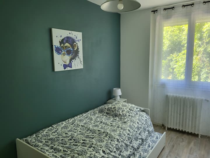 Spavaća soba 3 s pogledom na vrt s 2 ljiljana na izvlačenje