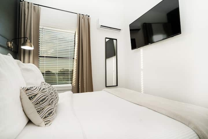 Bedroom with 55 inch Smart TV & Mini Split