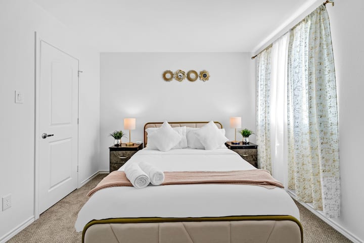 Upstairs bedroom with queen bed. 