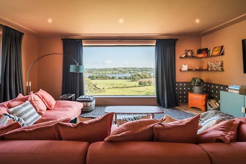 Popular Airbnb listing: A unique & spacious property with lakeside views in North Somerset