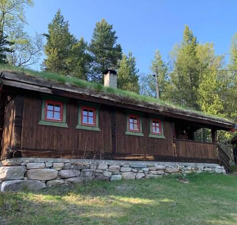 Cabin located on farm grounds right by Rondane.