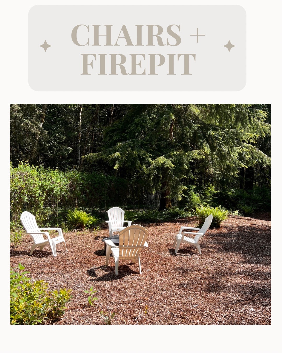 A relaxing seating area is presented, featuring four white chairs arranged around a central fire pit. The surroundings are naturally landscaped with greenery and wood chips, creating a serene outdoor environment for gatherings.