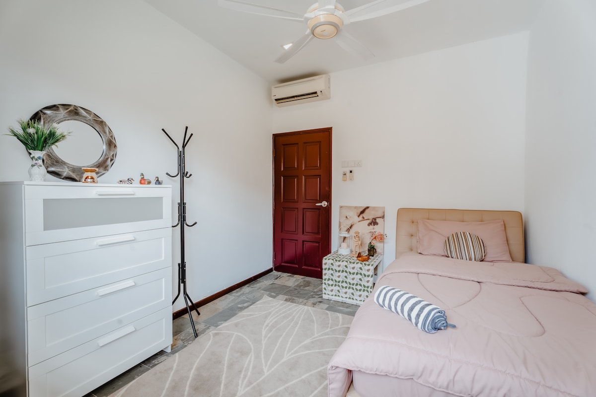 Room 3 - comes with 1 small double bed, fan and air conditioner