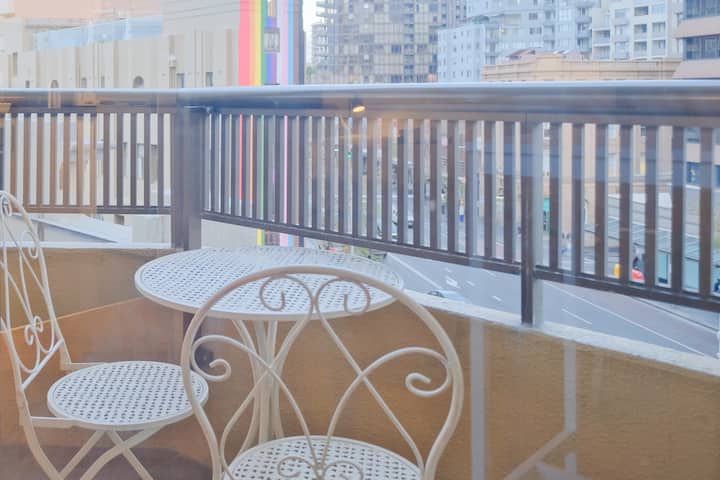 Enjoy a drink or relax with a book on the balcony after a day of exploring the city.