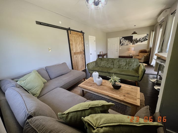 Secondary lounge space—great for games, reading, or extra guests (featuring a futon that can sleep 2 (petite guests or kids).