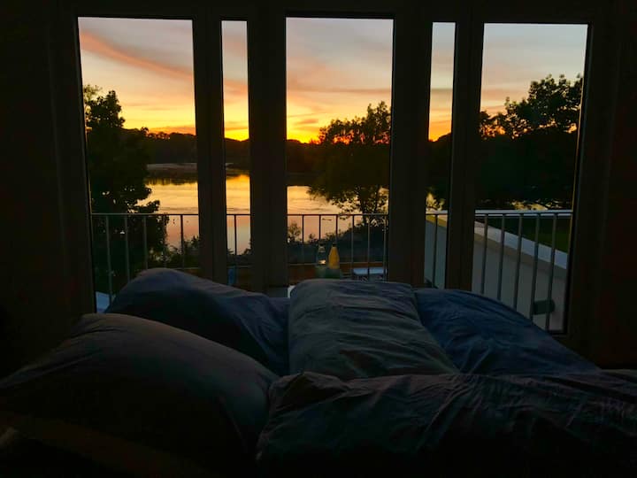 View from the bed of the master bedroom to a sundowner. 