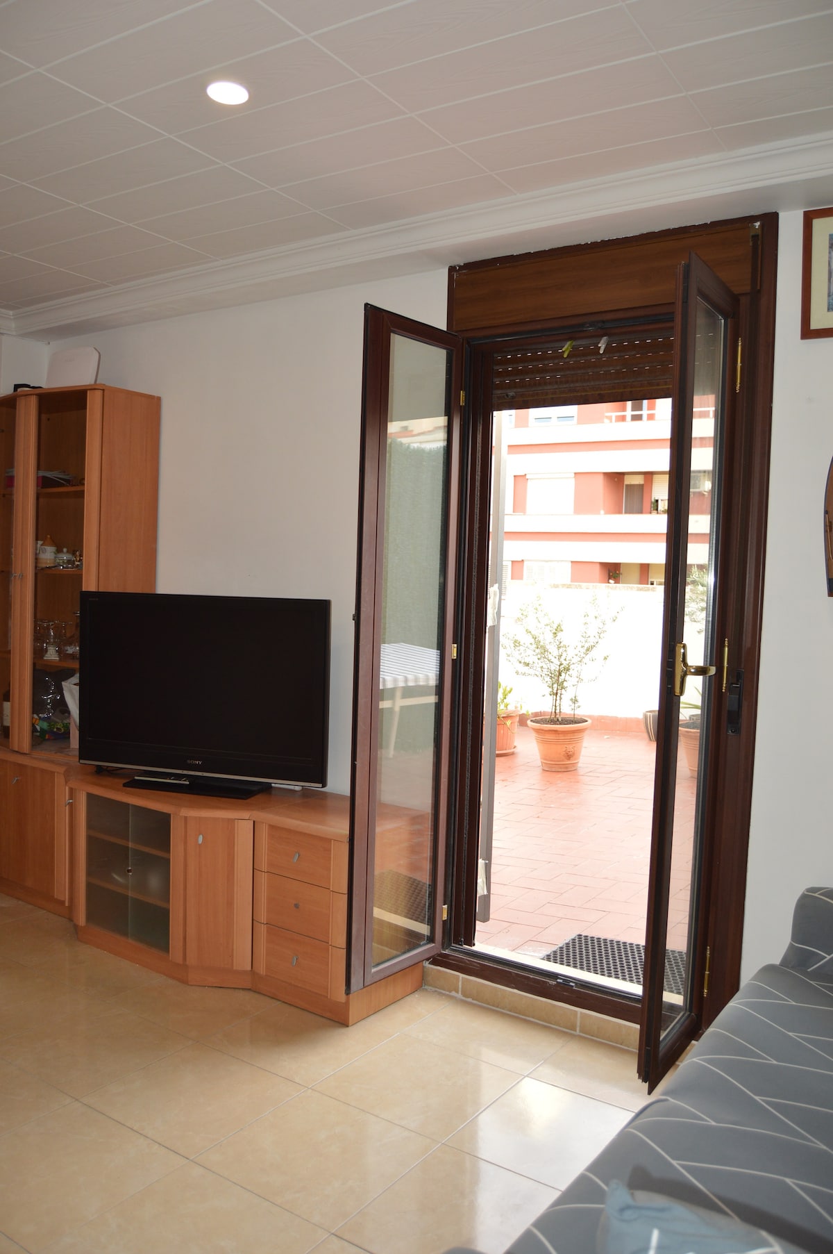 Direct access from the living room to a large private terrace with lounge chairs, table and umbrella and with spectacular views. Very nice dinner in the cool of the night during th