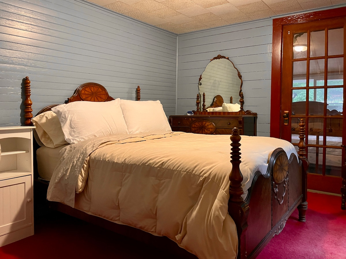 Bedroom #2, full size bed, connects to the screened in porch, 2nd floor