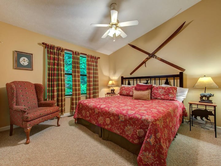 Master bedroom with private deck and hot tub and ensuite bathroom