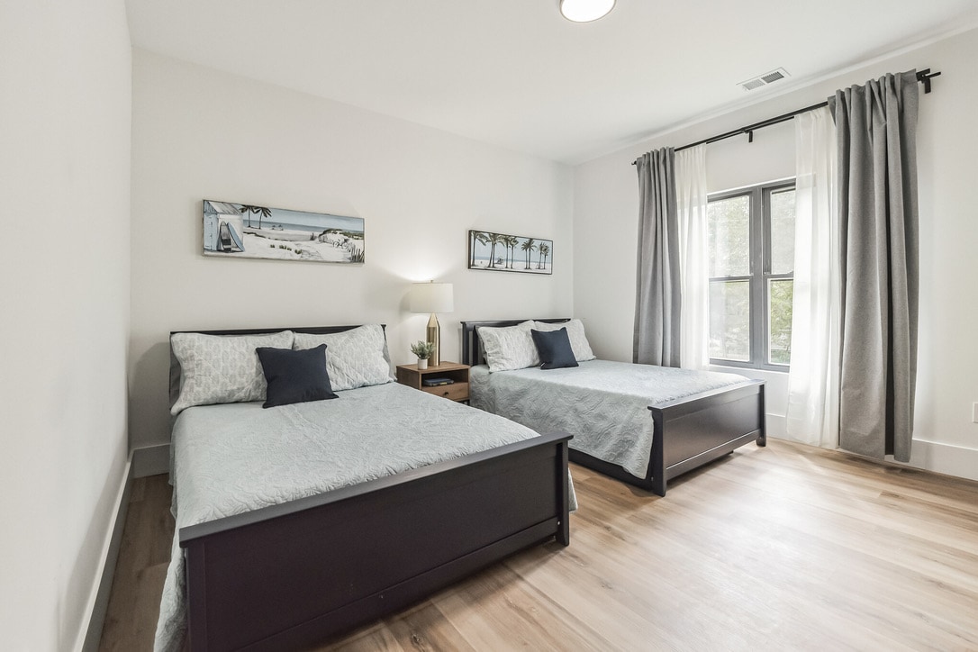 Chambre enfants avec 2 lits complets et 2 lits gigognes