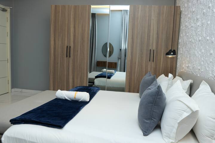 احلم في ملاذنا الفاخر لغرفة النوم، حيث يلتقي التساهل بالهدوء.