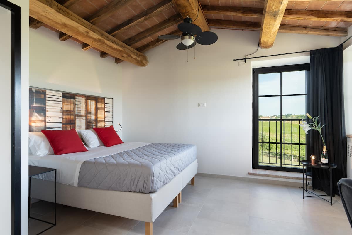 Bedroom 5 at Poggio alla Famina with wide windows