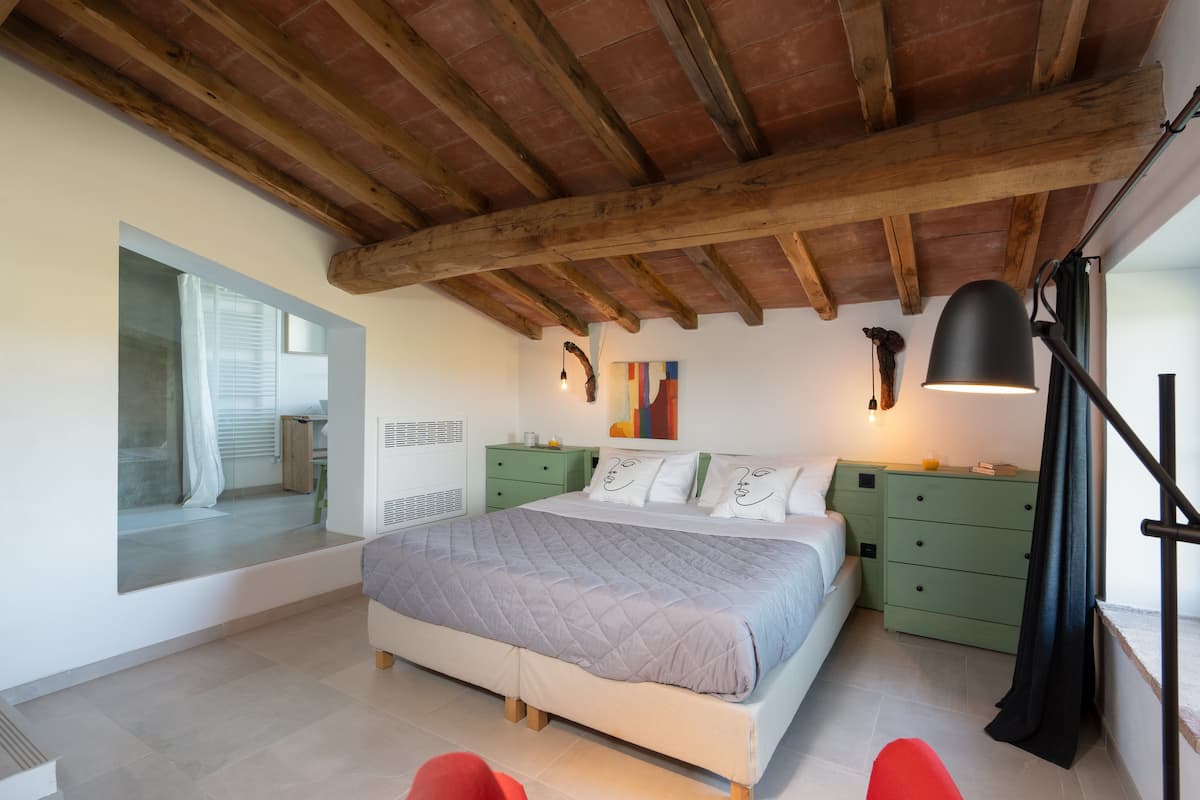Bedroom 6 at Poggio alla Famina with wood ceiling