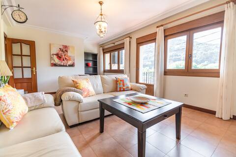 Apartamento con jardín y barbacoa