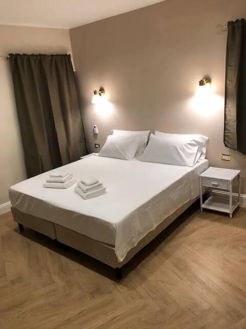 King room with terrace overlooking the pool and valley